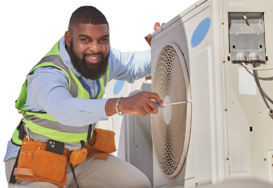 Technician repairing a washing machine in a service uniform with tools.