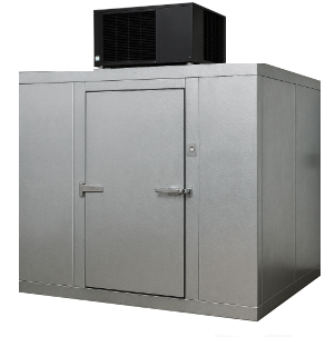 View of a large industrial HVAC or refrigeration unit with a gray metal exterior and a small access door, situated on a rooftop or outdoor area.