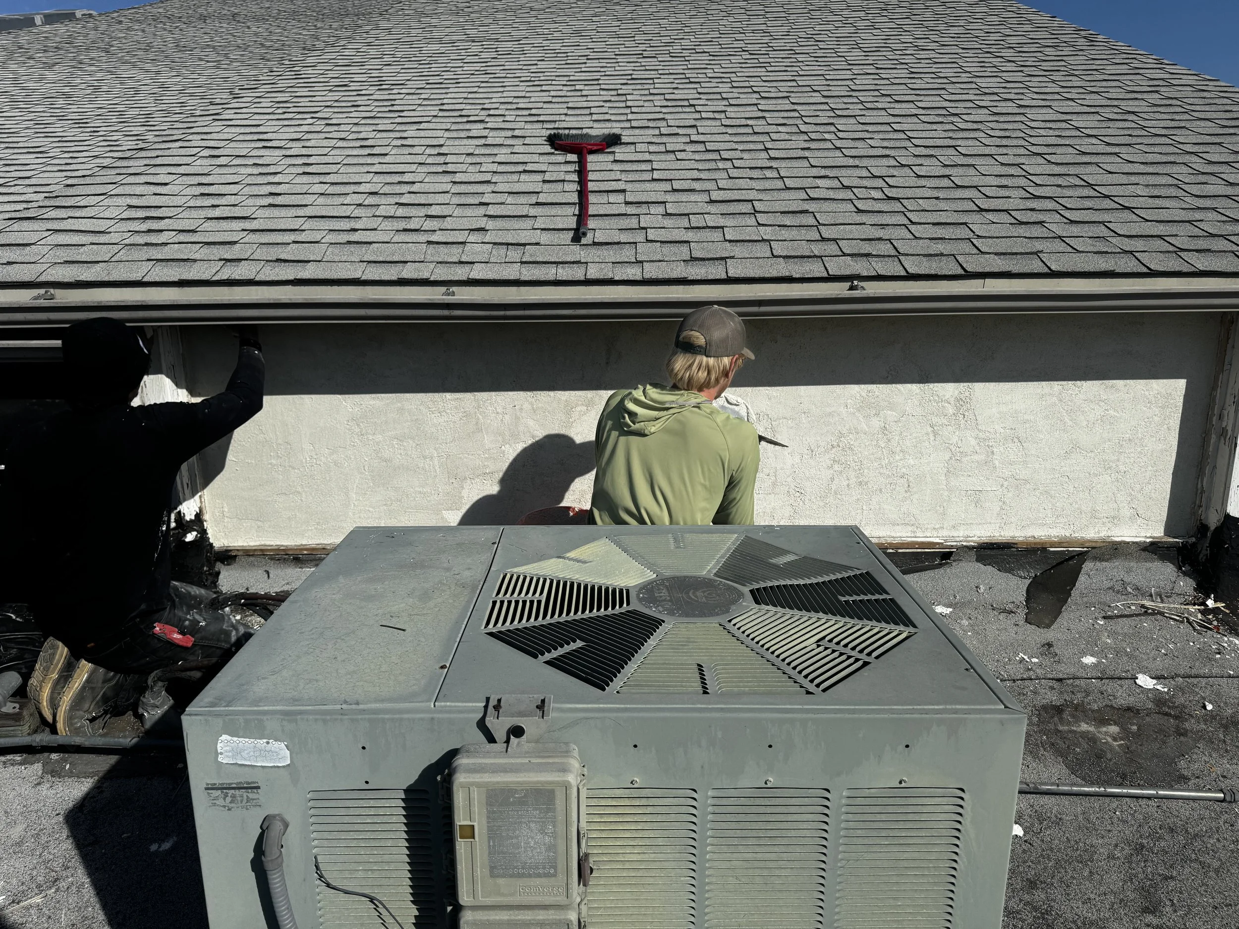 Exterior renovation in San Diego with roofing and stucco repair work performed by Foremost Building Solutions