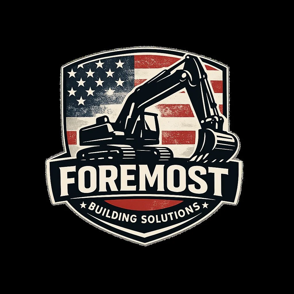 A logo featuring a black construction excavator in front of a distressed American flag background. Below, the text reads "FOREMOST" in large letters, with "BUILDING SOLUTIONS" beneath in a smaller font.