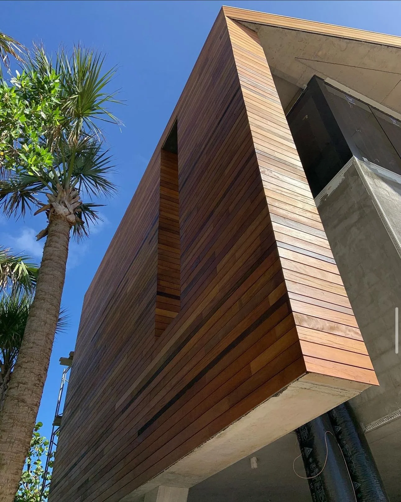 Hardwood siding installation in San Diego featuring modern exterior cladding and clean architectural lines by Foremost Building Solutions