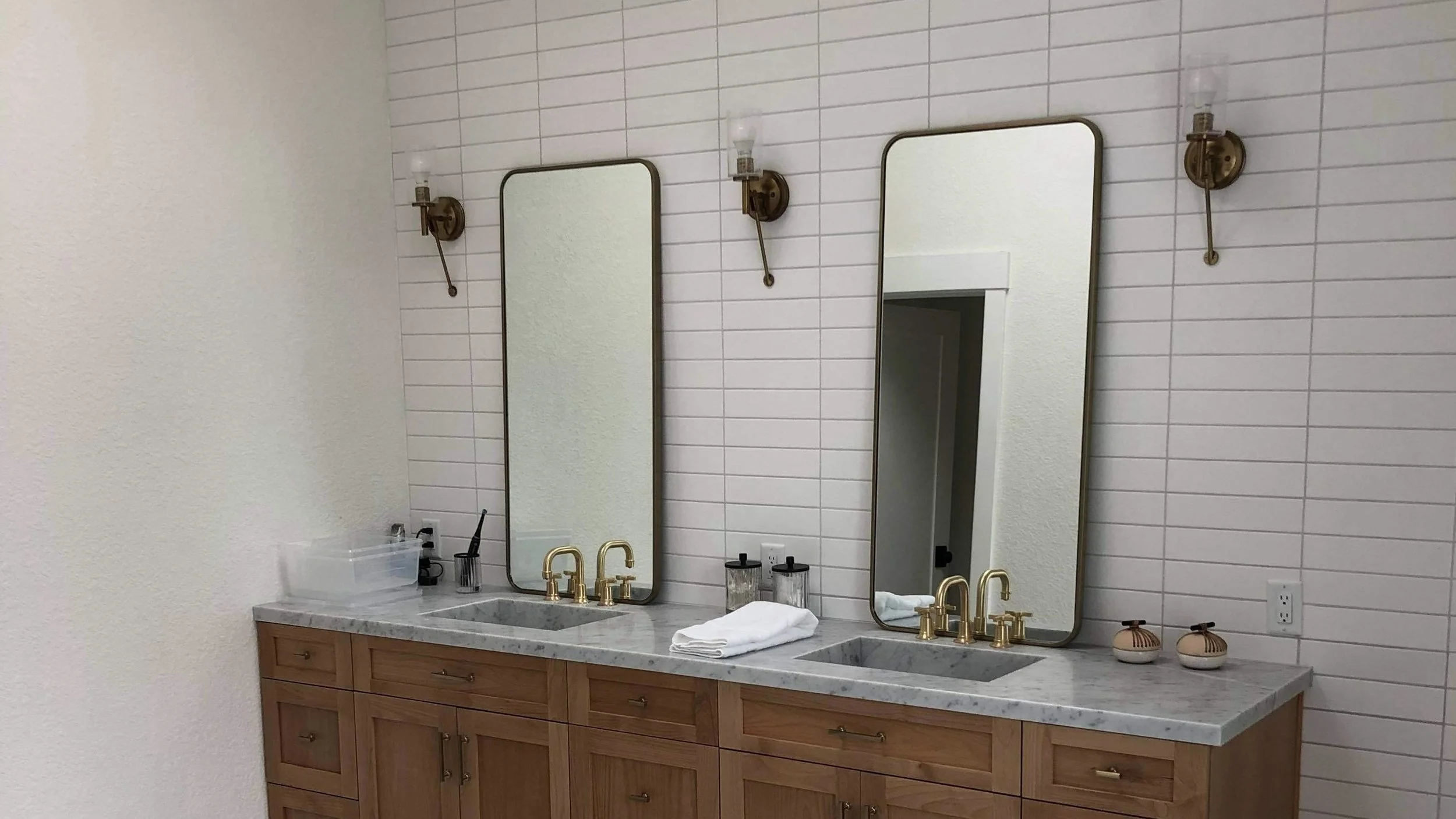 Modern bathroom remodel in Carlsbad, CA by Foremost Building Solutions.