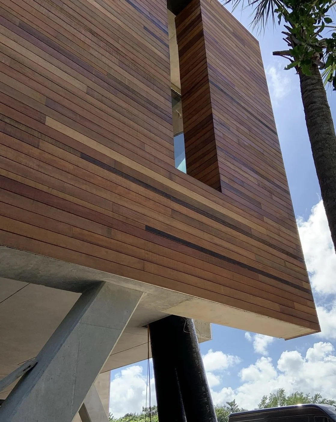 Exterior renovation in San Diego featuring modern wood siding installation by Foremost Building Solutions