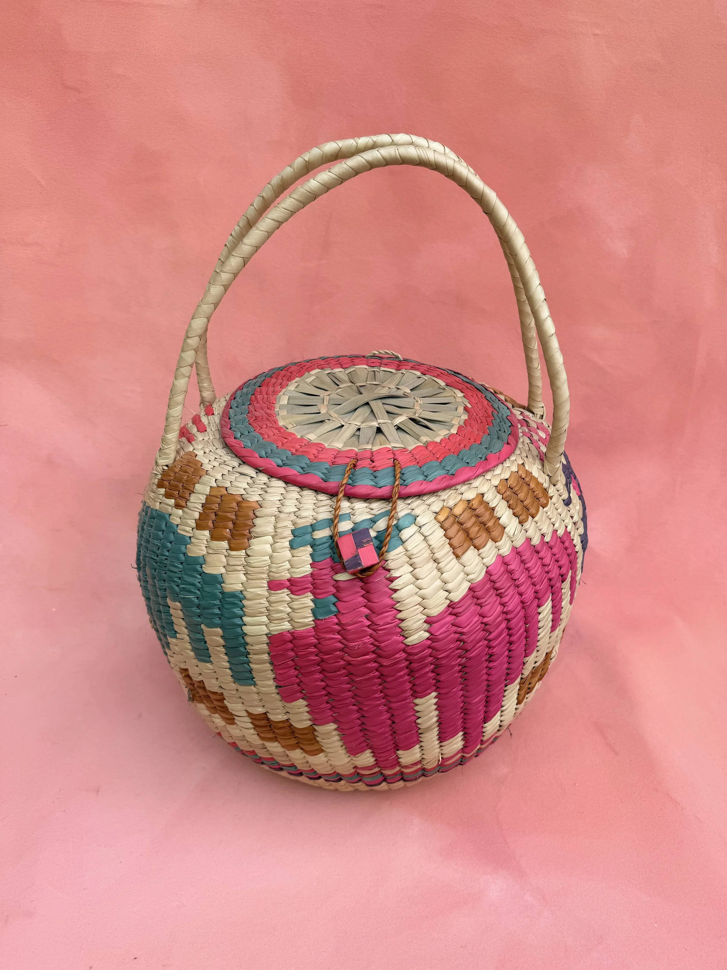 Colorful lidded basket with handles