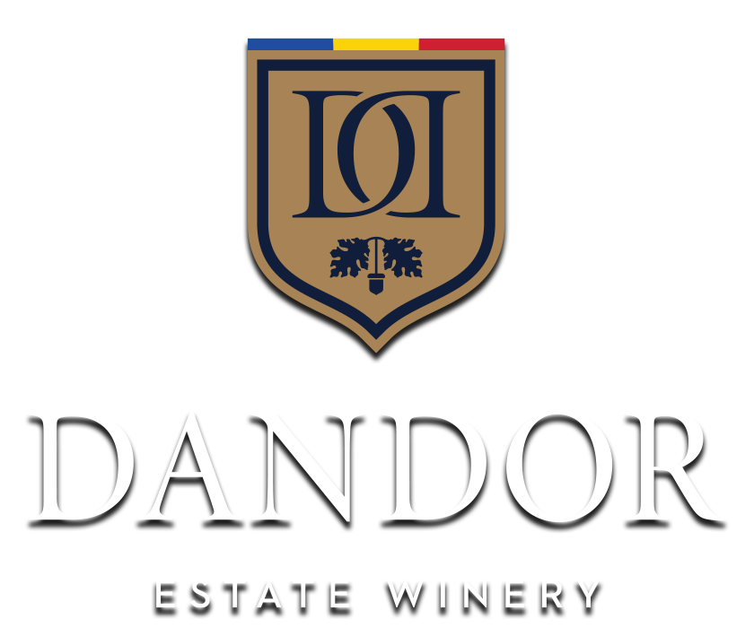Logo for Dandor Estate Winery featuring a shield and a grapevine illustration.