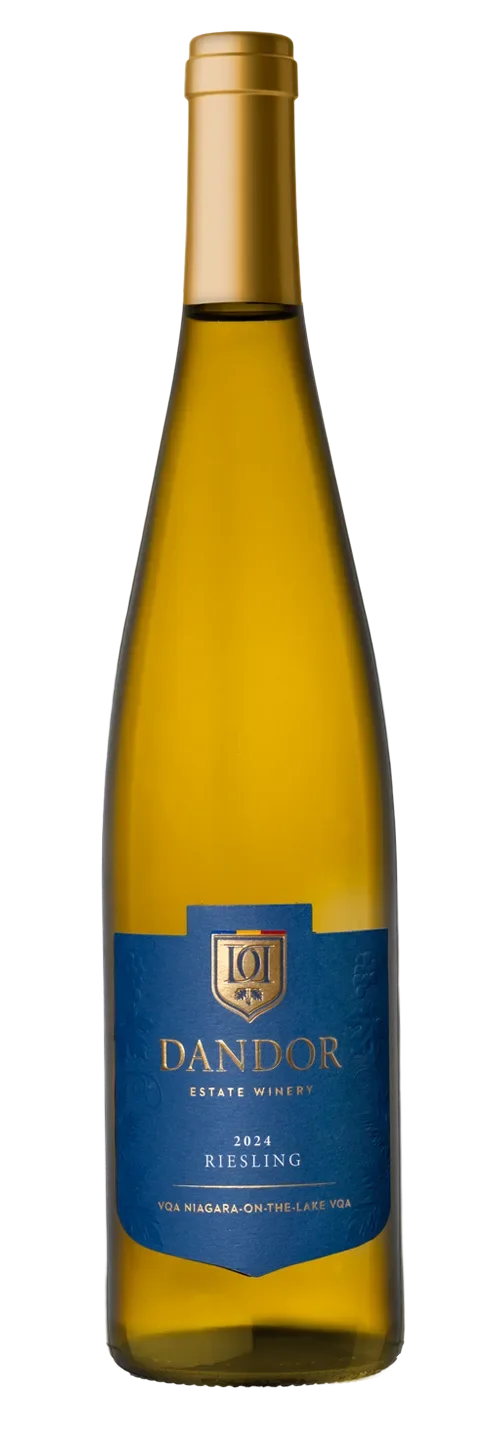 A tall bottle of white wine with a blue label and gold cap, labeled Dandor Estate Winery 2024 Riesling from Niagara-on-the-Lake.