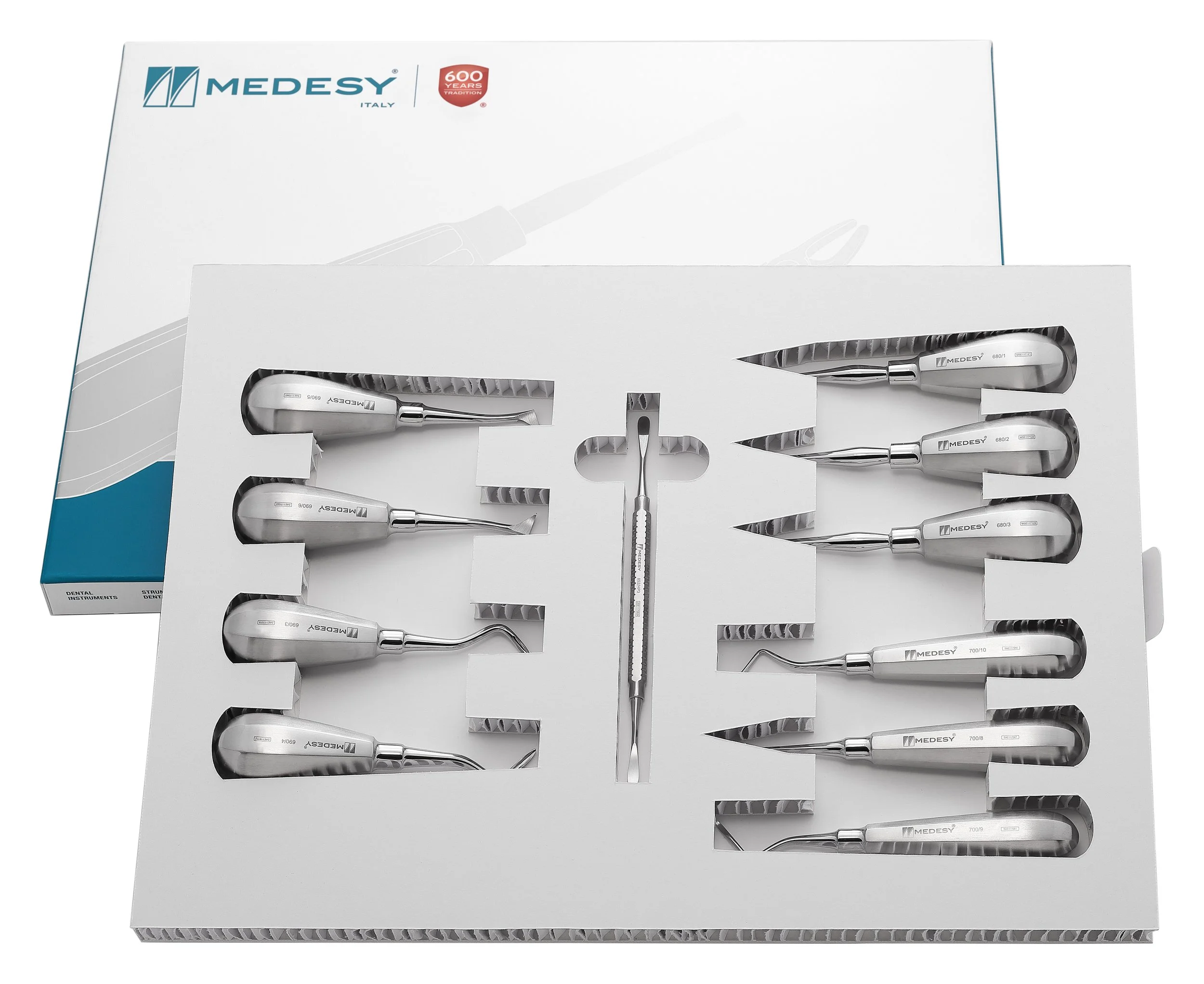 Set of five sanitary surgical instruments in foam packaging for medical use.