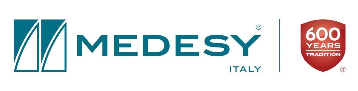Logo of Medesy Italy with a shield symbol indicating 600 years of tradition.