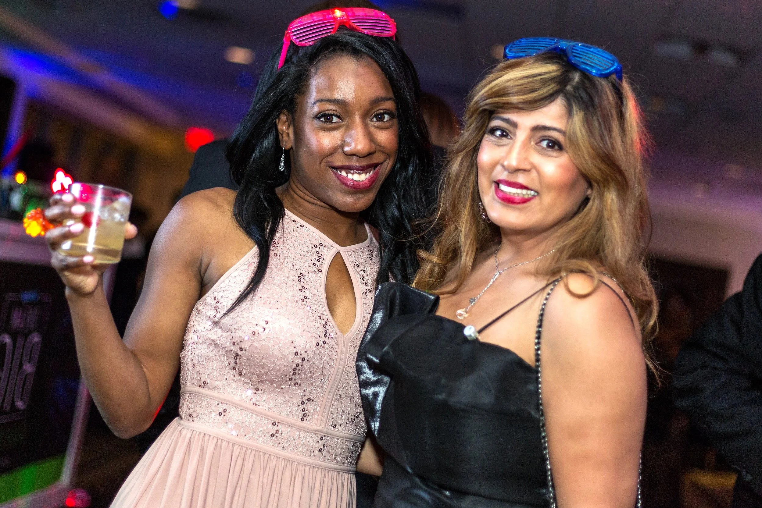 Open-air photo booth setup with professional backdrop and studio lighting at a corporate gala in Atanta.