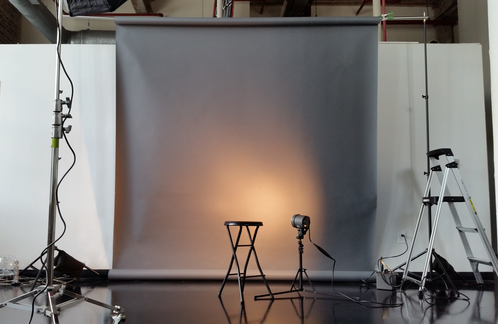 professional photography studio setup with softbox lighting, representing lifestyle and individual portrait sessions by Jason Meek Photography.