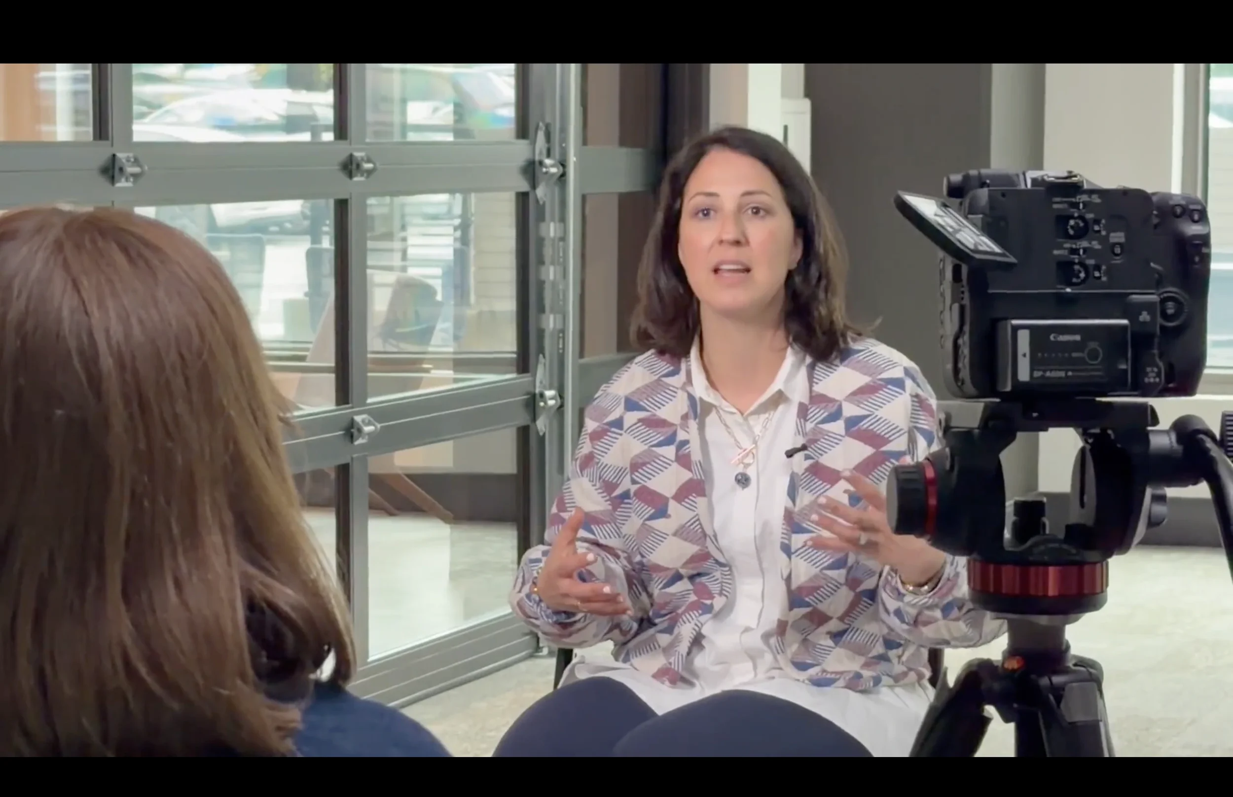 Behind the scenes of an executive interview for the Jewish Education Innovation Challenge in Atlanta, filmed by jm photographics with a Canon cinema camera and lavalier microphone.