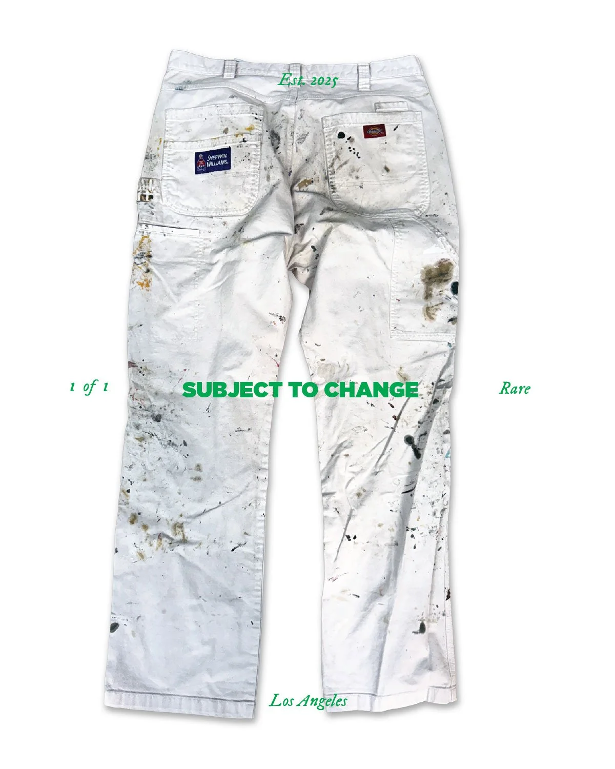 Pair of white paint-splattered jeans with patches and labels, with green text overlay saying "SUBJECT TO CHANGE" and details like "Est. 2025," "1 of 1," "Rare," and location "Los Angeles."