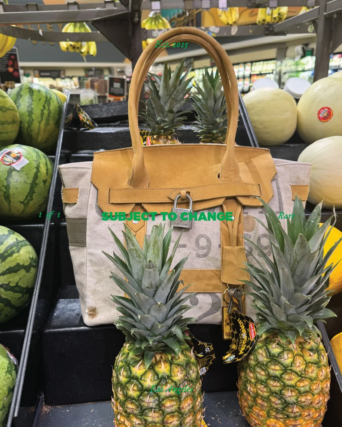 Pineapples and a bag on display at a grocery store produce section.