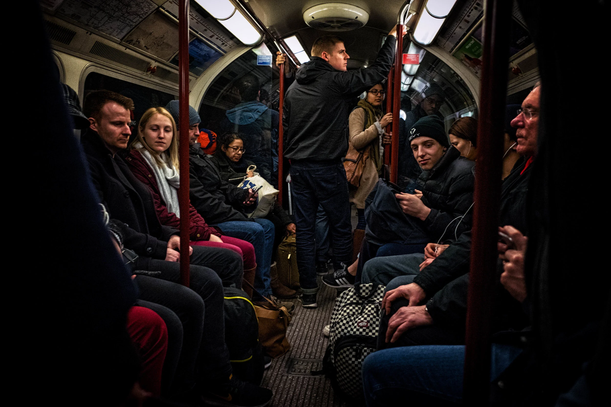 All in this together - humanity; London Underground, England. February 2017.
