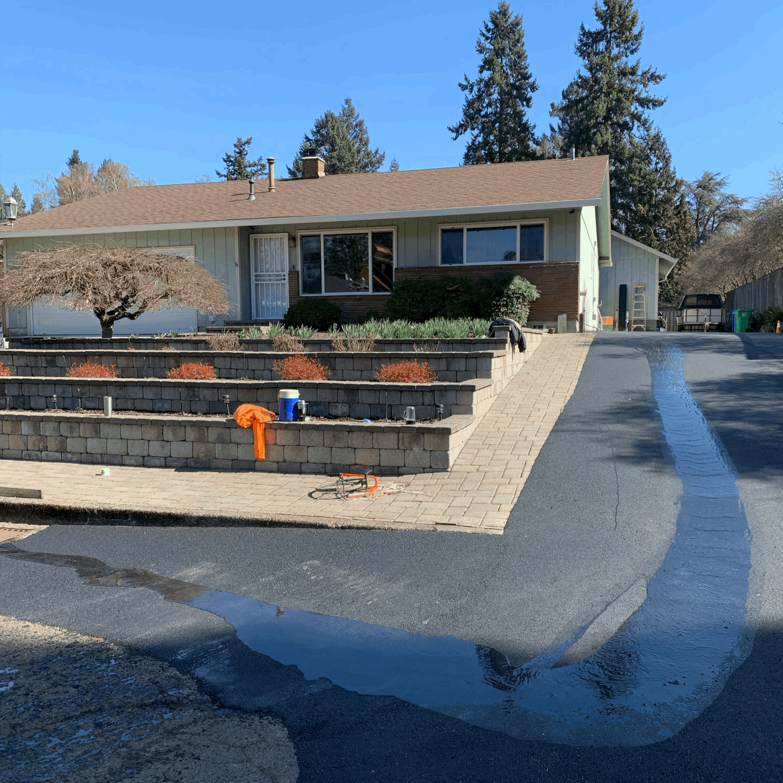 Showing an asphalt driveway with great drainage