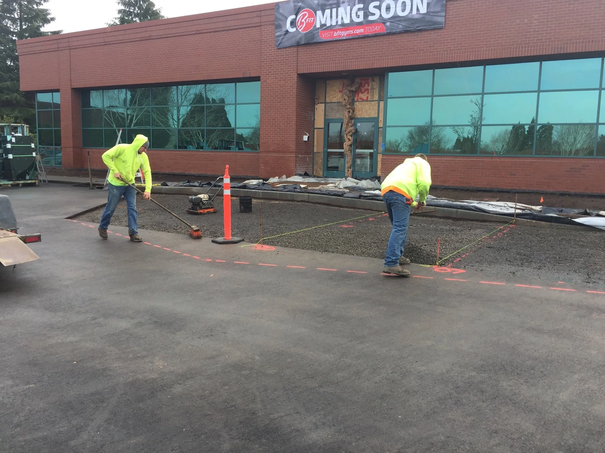 On Point Paving grading a commercial parking lot to get ready for asphalt paving