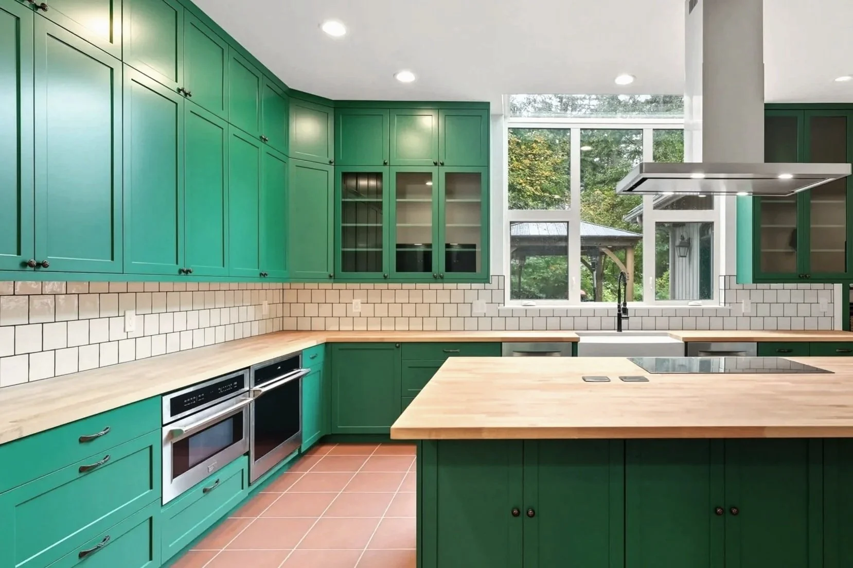 Open concept kitchen with island, modern cabinets, stainless appliances