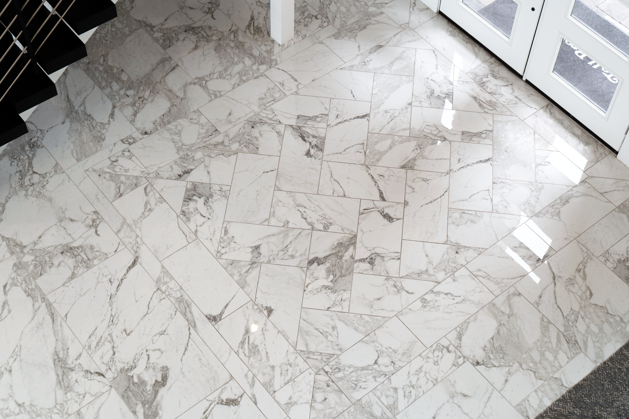 Modern living room featuring marble flooring and open layout