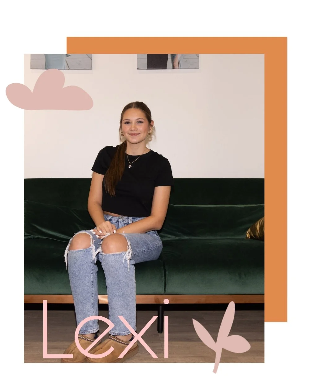 A young woman with long brown hair sitting on a dark green velvet sofa, wearing a black t-shirt, ripped jeans, tan boots, and jewelry, smiling at the camera. The background features a white wall with two small square mirrors and pink and peach-colored graphic elements, including a cloud and the name 'Lexi' with a butterfly.