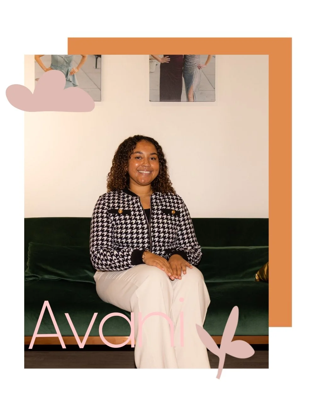 A woman with curly hair and a houndstooth jacket sitting on a dark green sofa, smiling at the camera. The background has a white wall with two photographs and decorative elements including a pink cloud, a pink signature reading 'Avani,' and a pink leaf.