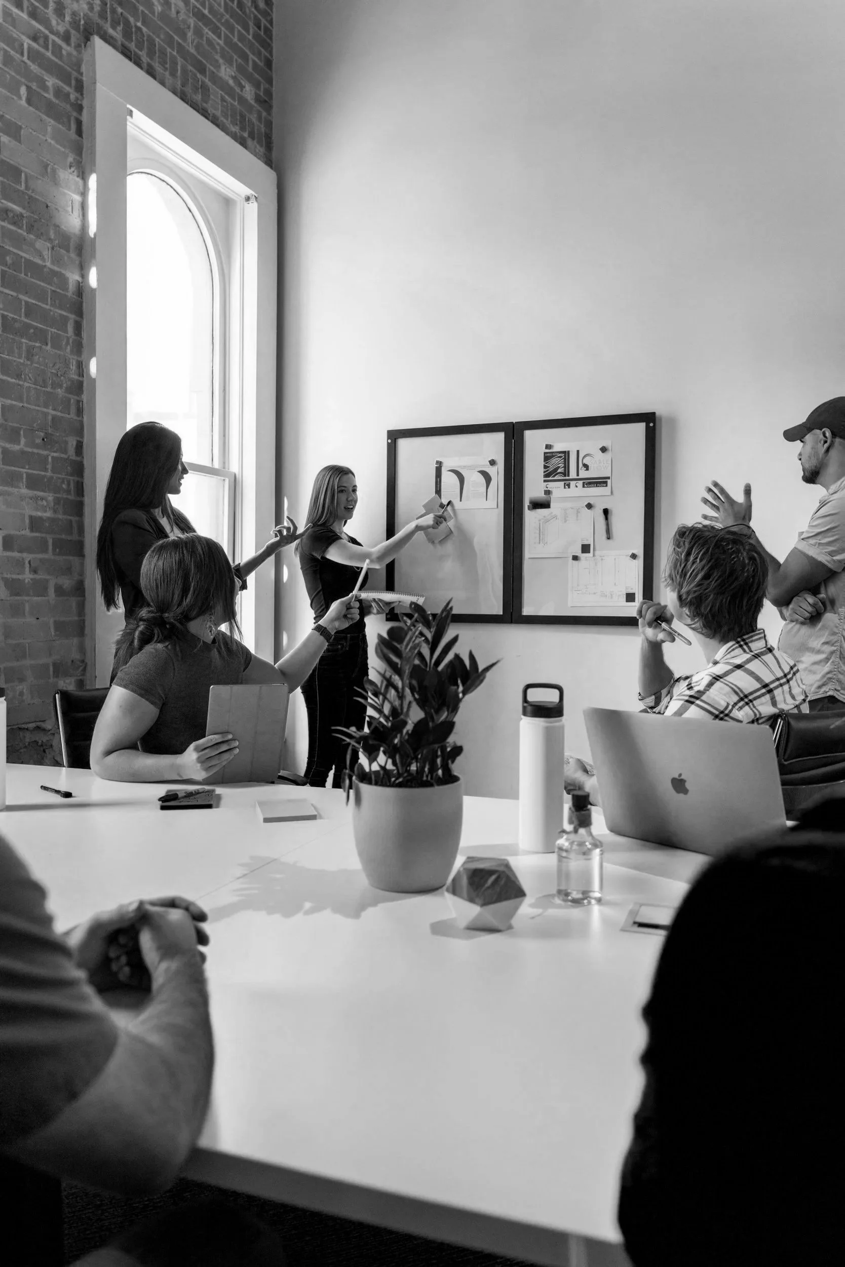 Group of people collaborating in a conference room.