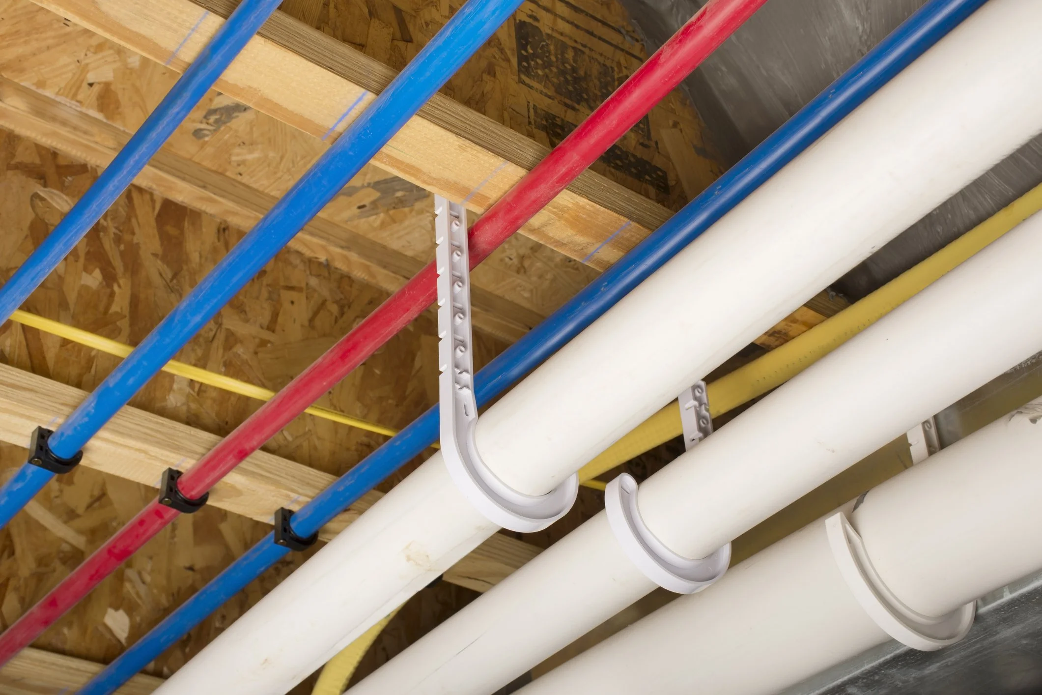 pvc pipes mounted under a ceiling