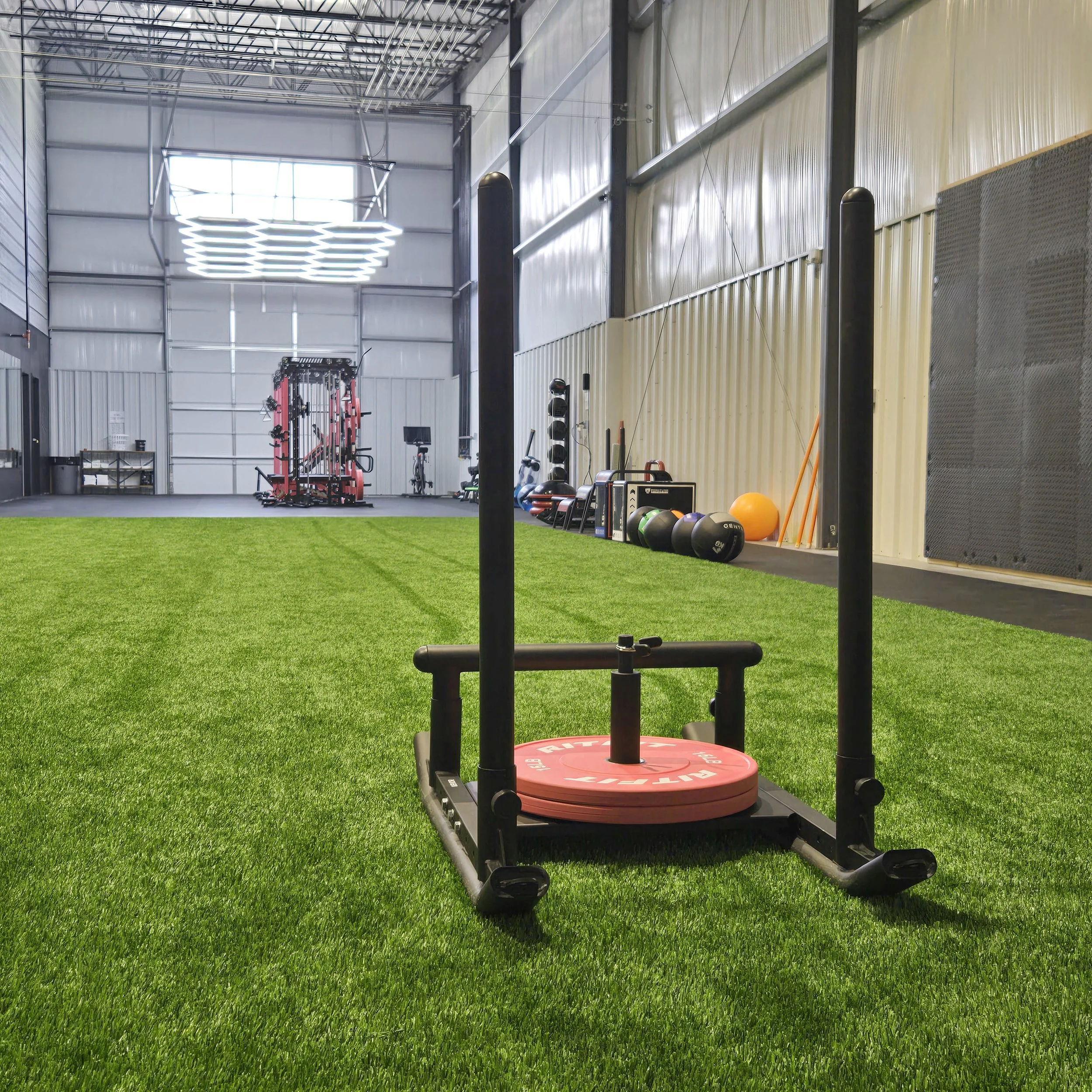Next to our gym is a 55 foot x 20 foot open turf area for strength & conditioning.  Included for you to use are push/sprint sleds, tidal tanks, plyometric jump boxes and medicine balls.