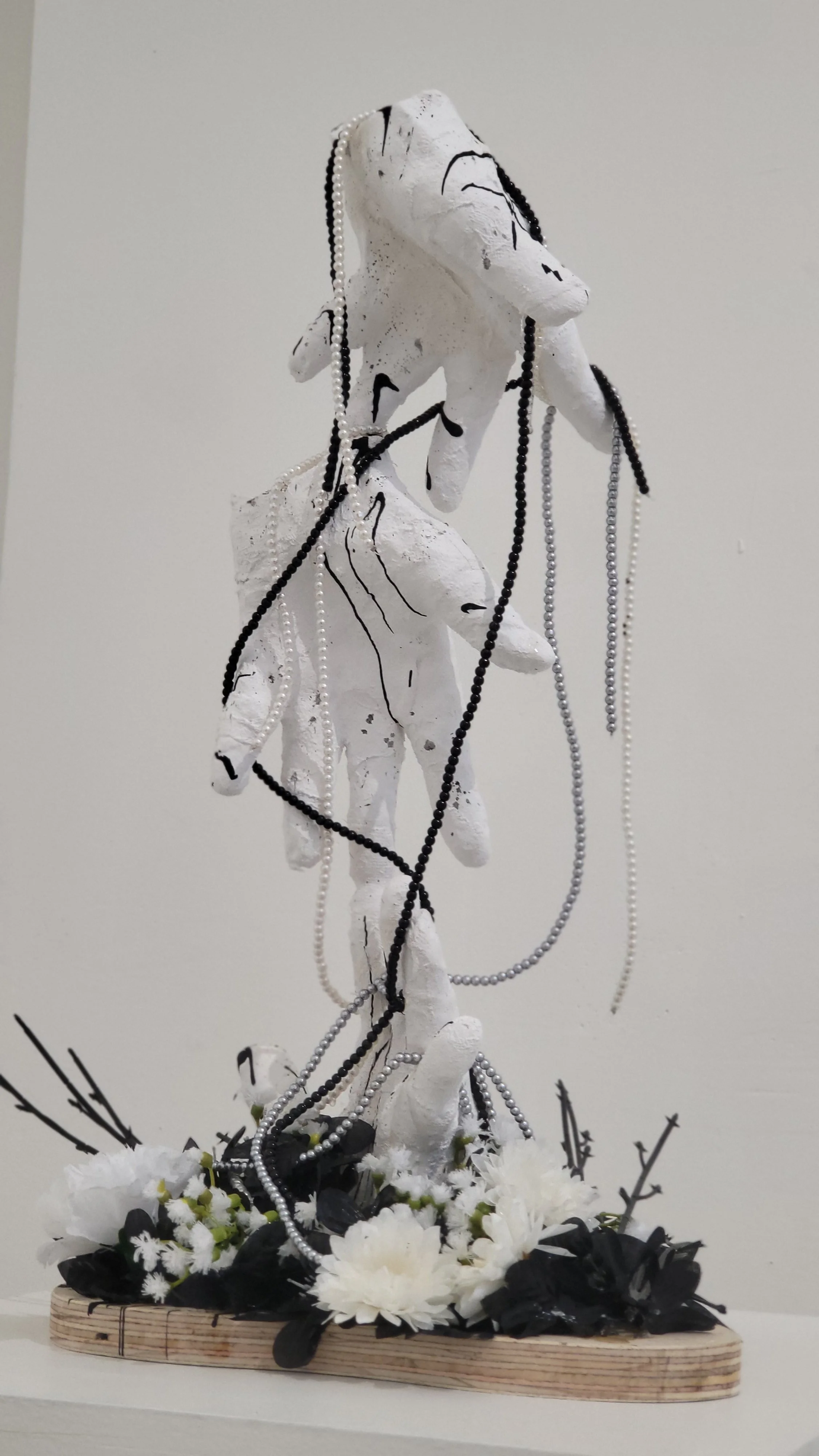 Hands of desire; Plaster sculpture (Side 3)