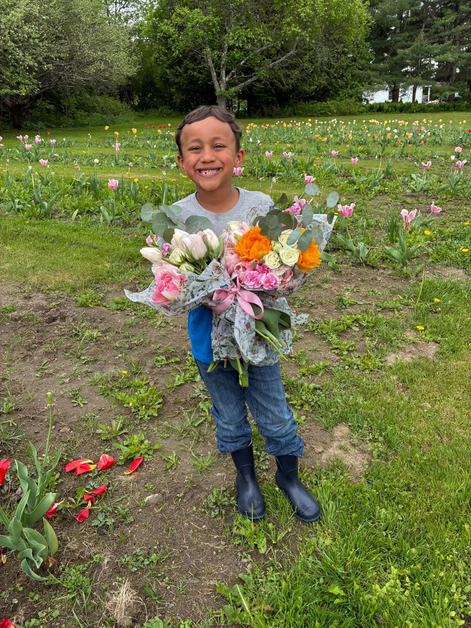 My little helper for the afternoon putting together graduation bouquets while the others nap! 💛