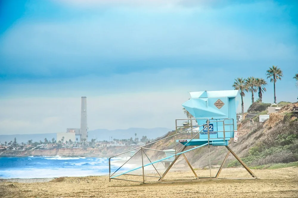 lifeguard+tower+22+and+carlsbad+power+plant+in+background+blue+sky.jpg