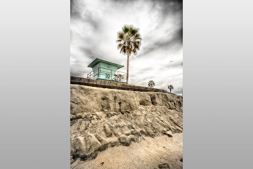 lifeguard tower 33 with palm tree at carlsbad state beach.jpg