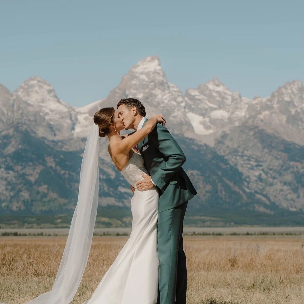 Love is in the air&hellip; and in the Tetons.
This Jackson Hole summer wedding was layered in soft color, surrounded by endless lush green landscape, and closed the night with a laser show that felt as magical as the vows themselves. Will forever be 