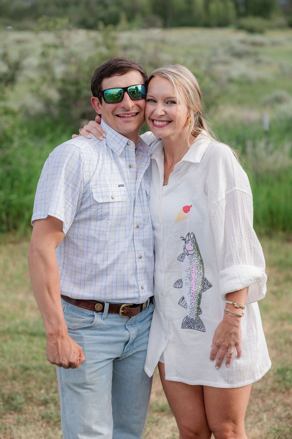 Bride and groom together during their Grand Teton welcome party for a Wyoming wedding.