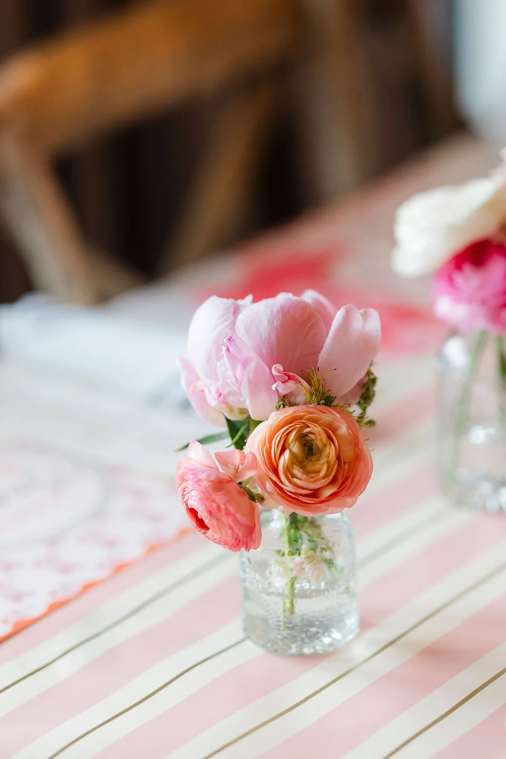Colorful floral centerpiece displayed during a Grand Teton wedding welcome event.
