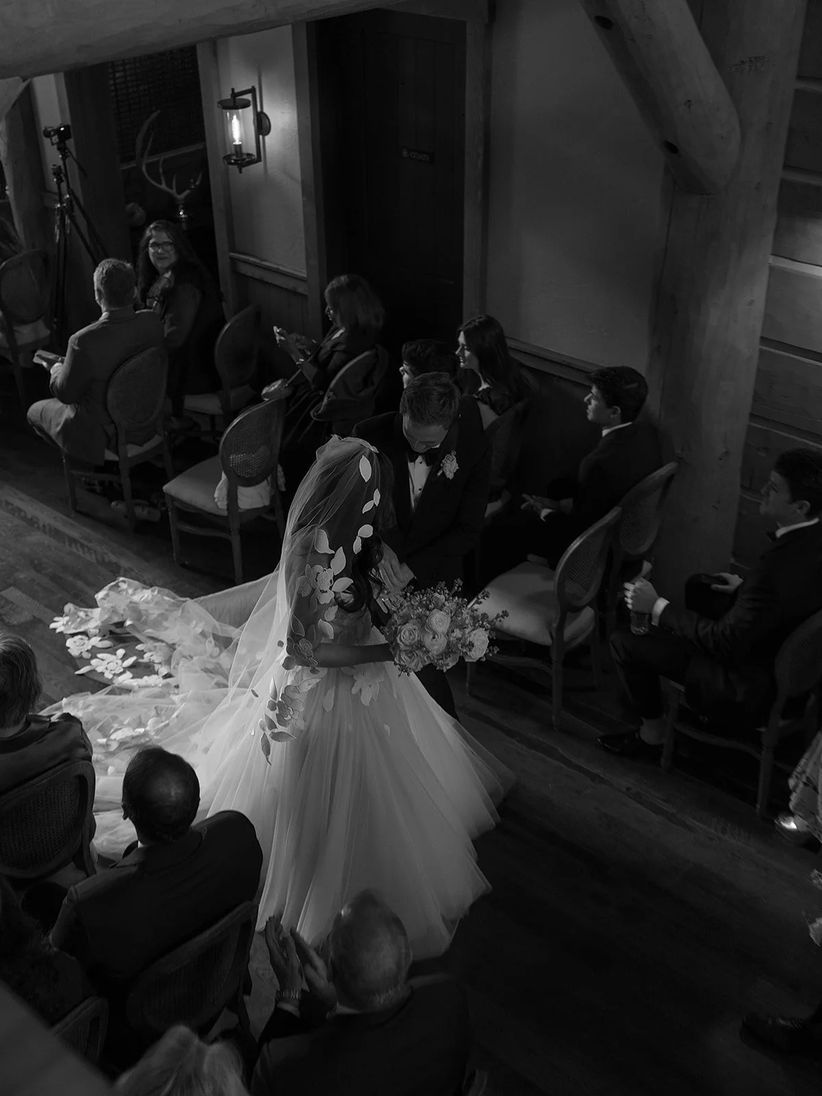 Snake River Sporting Club wedding ceremony in the clubhouse foyer with string quartet and French doors