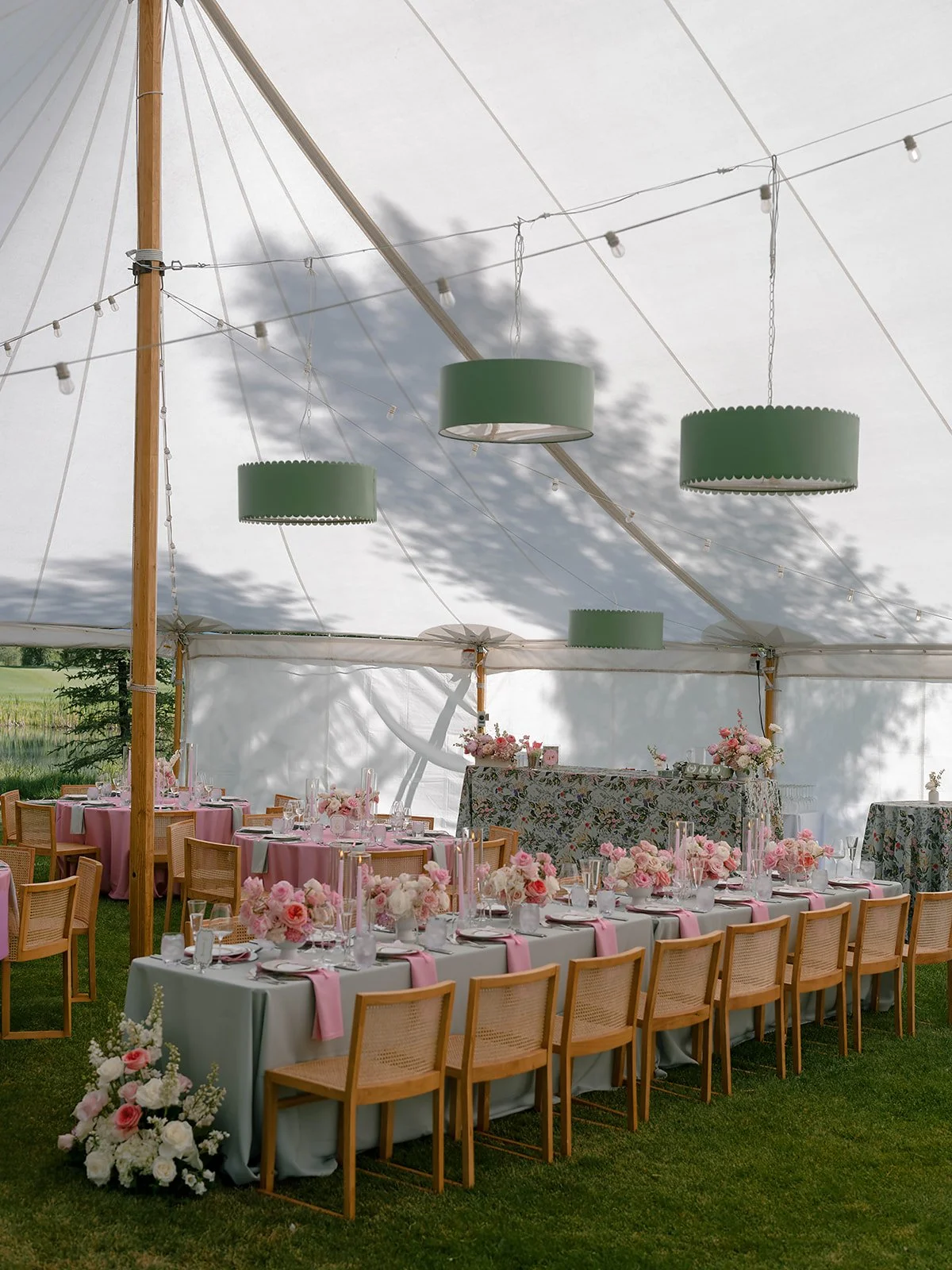 Reception tablescape with pink and green linens and custom Lola Valentina design at Snake River Sporting Club