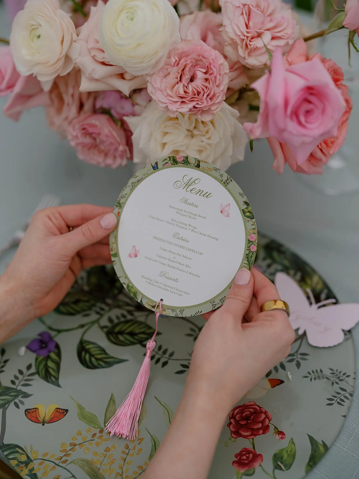 Reception tablescape with pink and green linens and custom Lola Valentina design at Snake River Sporting Club