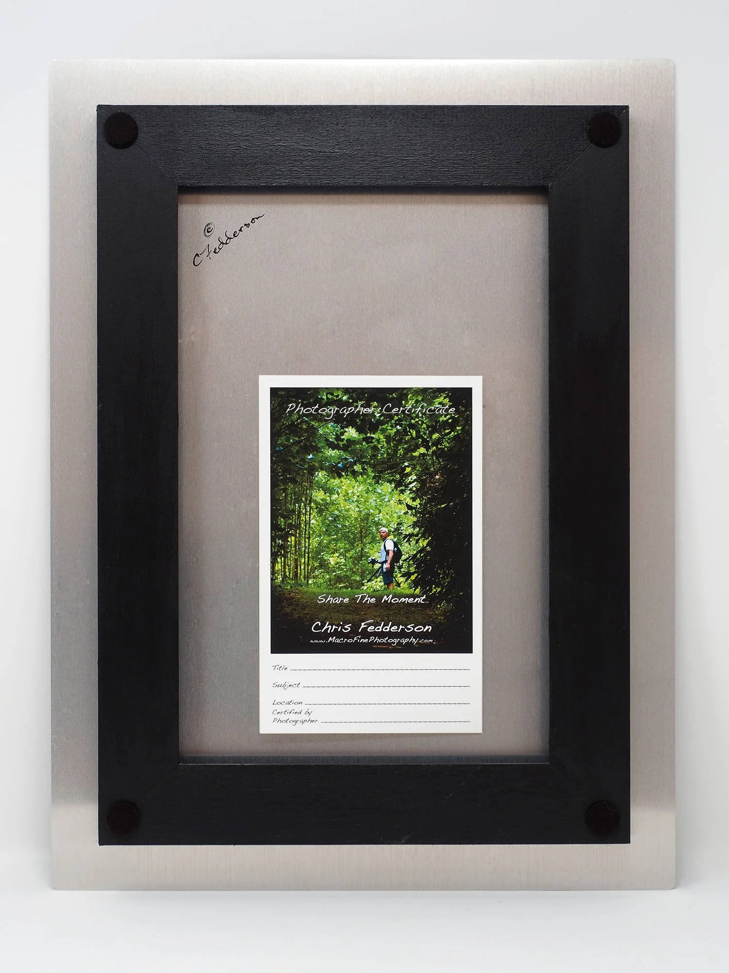 back of aluminum showing frame used for hanging