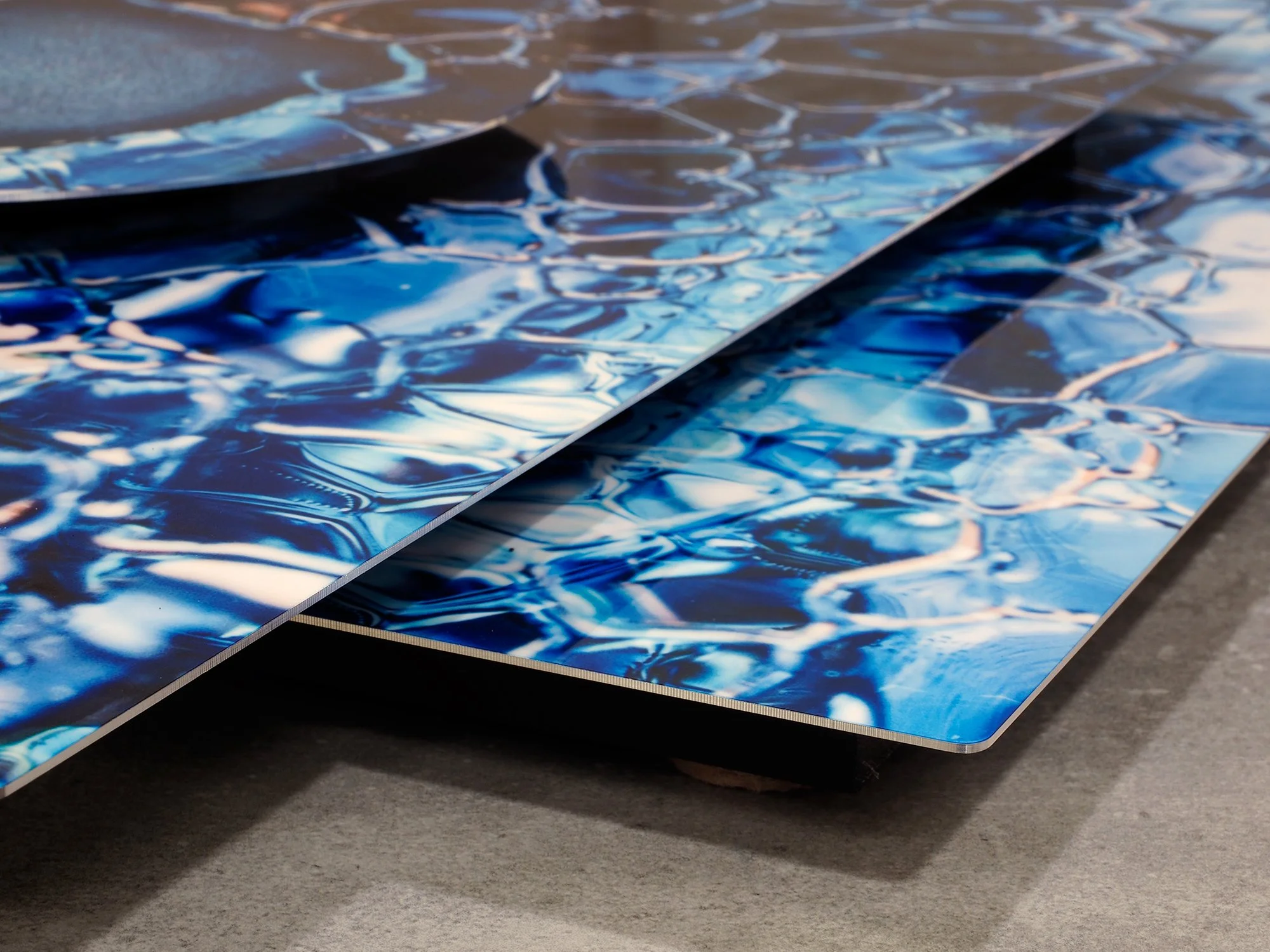 corner view of a sculptural Image of ice on window glass