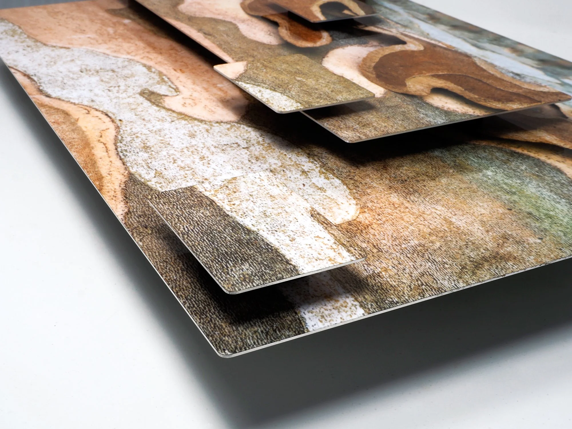 corner view of an image of a sculptural image of bark of an American sycamore bark