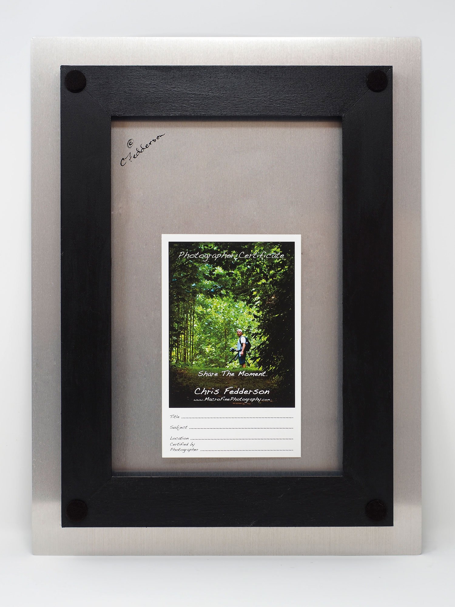 back of aluminum showing frame used for hanging