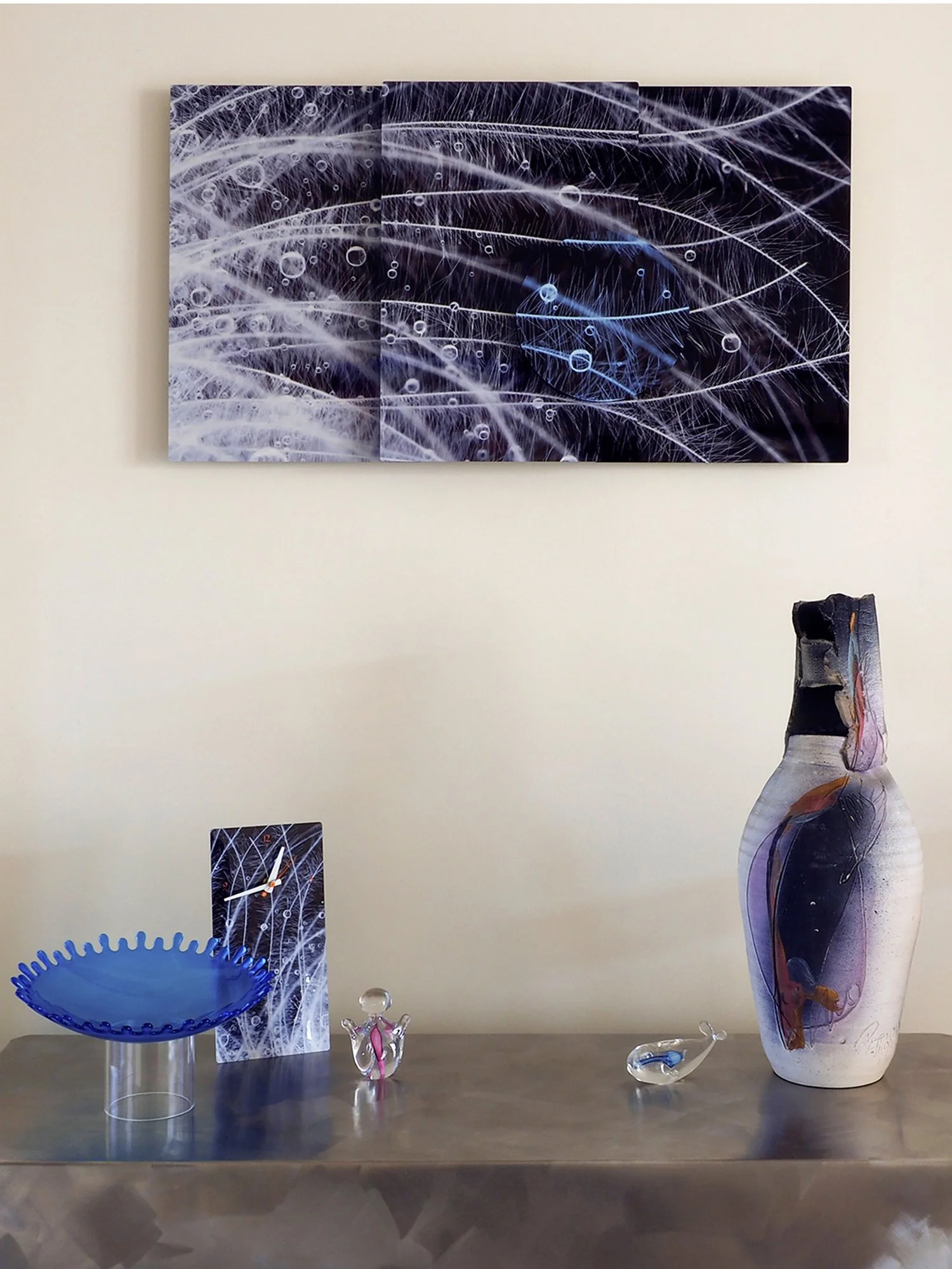 room view large sculptural image of goose feather with water drops