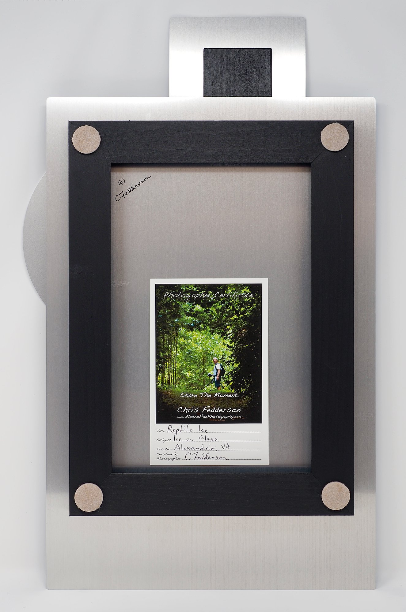 back of aluminum showing frame used for hanging