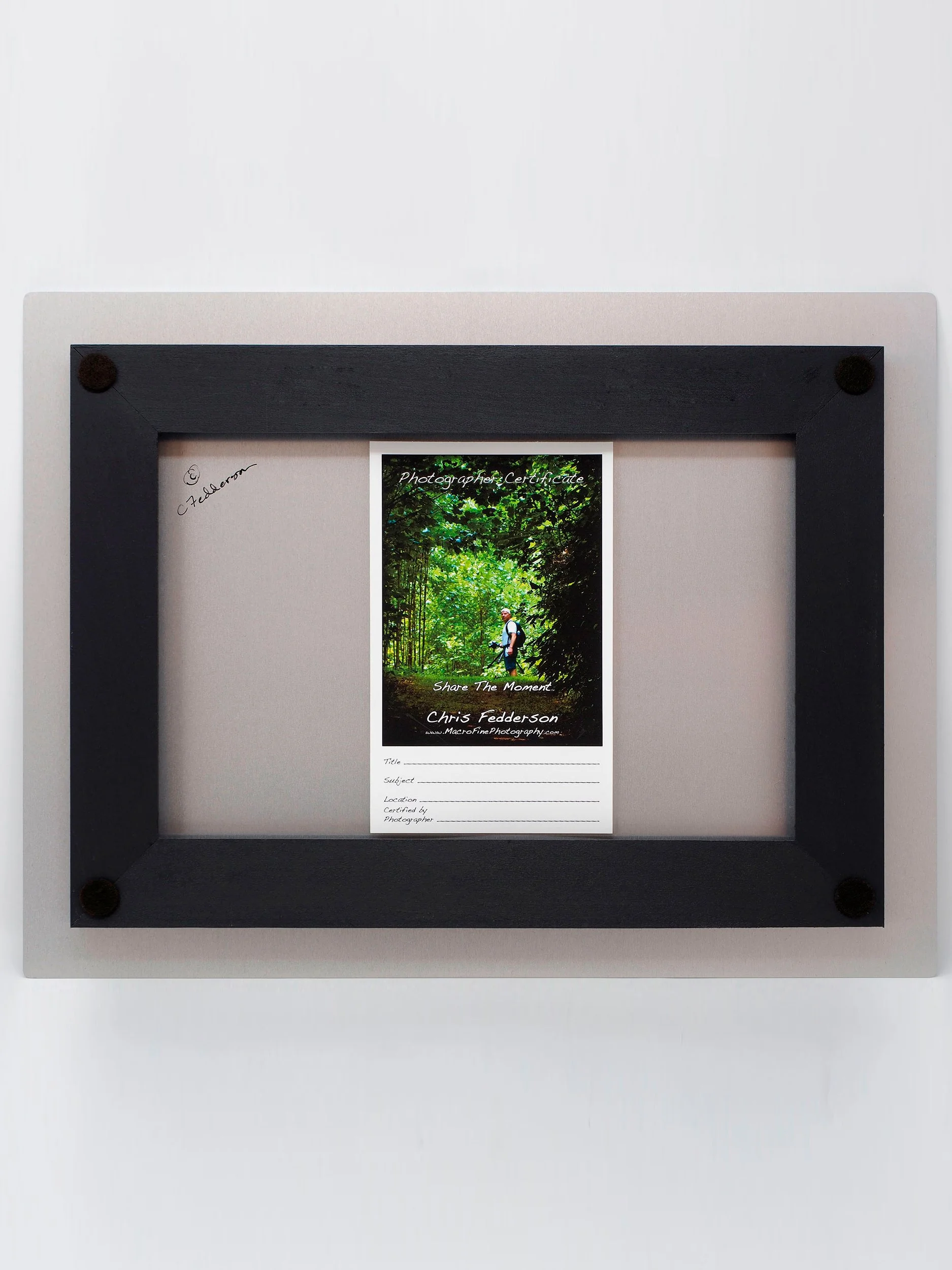 back of aluminum showing frame used for hanging