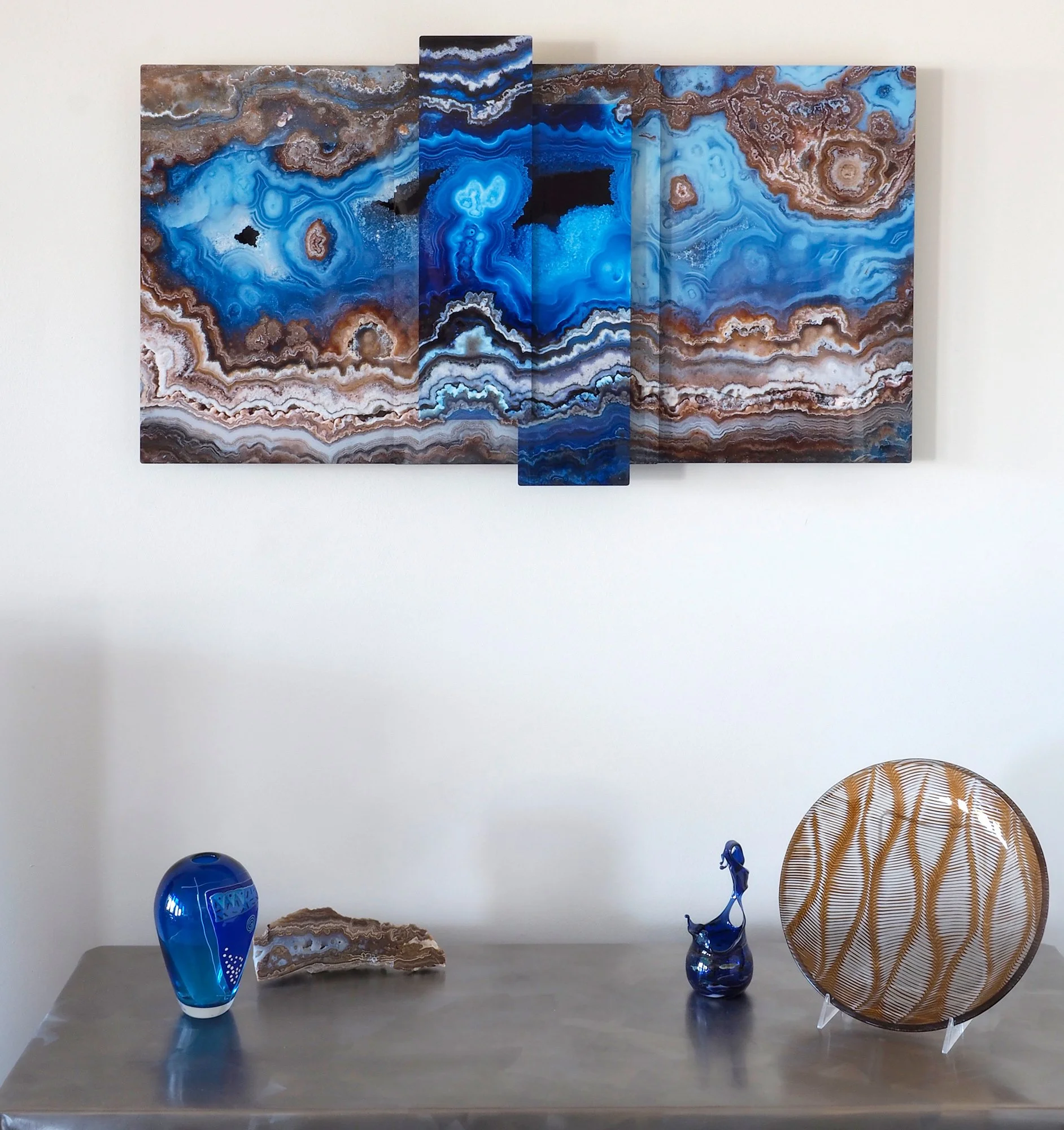 room view of large sculptural image of a slice of jasper-agate