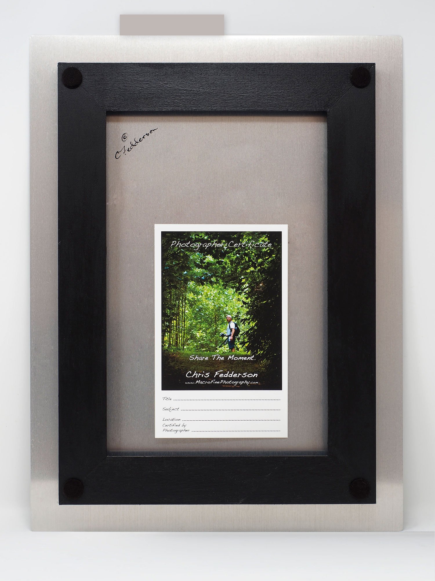 back of aluminum showing frame used for hanging