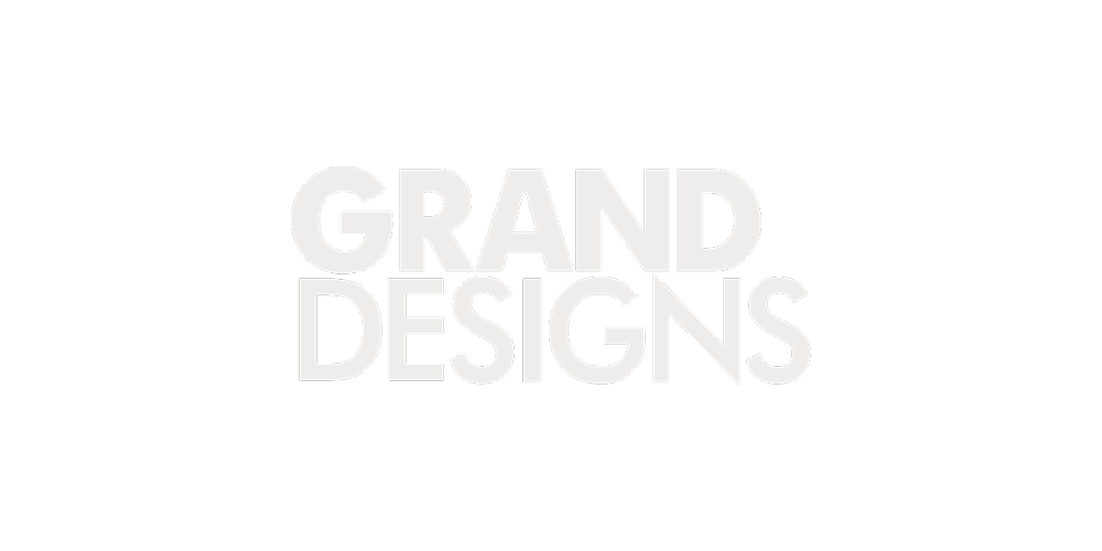 Text logo that reads "Grand Designs" in large white letters on a black background.