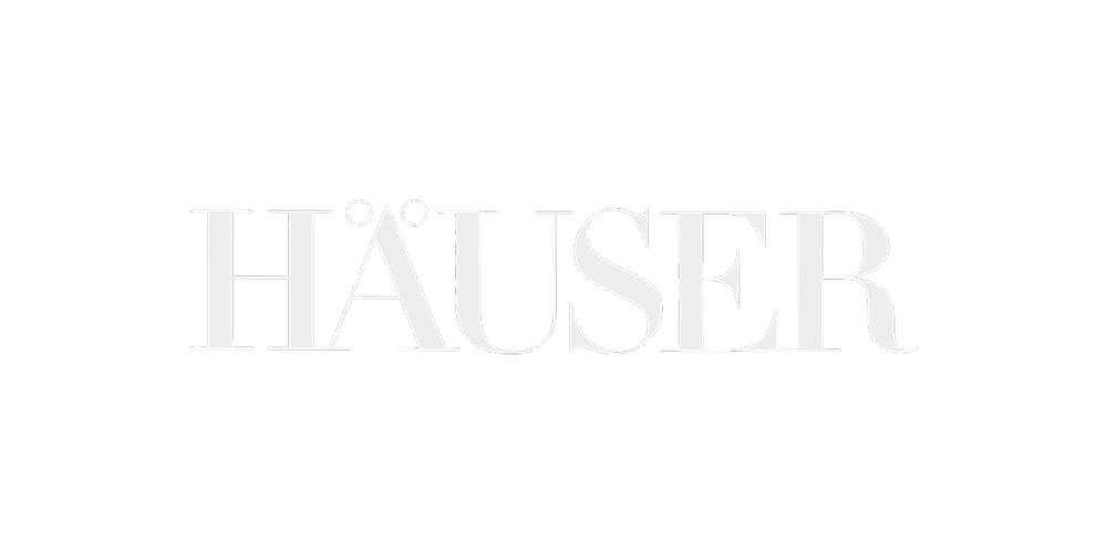 The word 'HAUSER' written in large, silver letters on a black background.