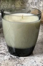 A glass vessel of one hundred percent soy wax with a relaxing fragrance that brings comfort to your home or office.