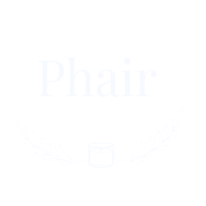 Logo for Phair Home & Body, featuring a transparent background with white text, decorative branches, and a small candle jar illustration.